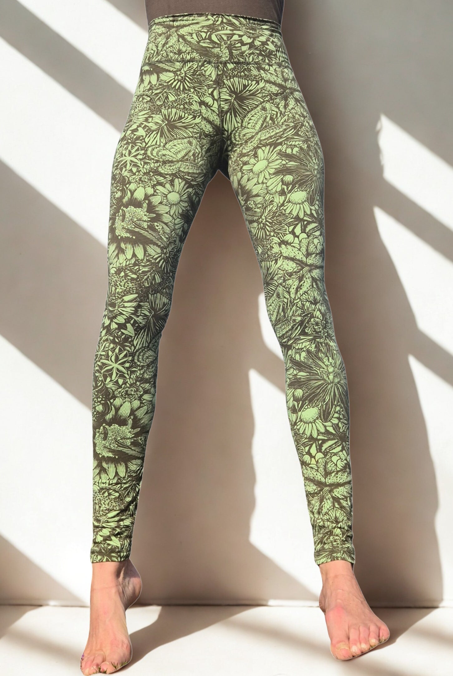 Green Olive Bloom pattern leggings - funky simplicity - worn by model shown from the front